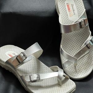 Gently used. Silver. Size 8.